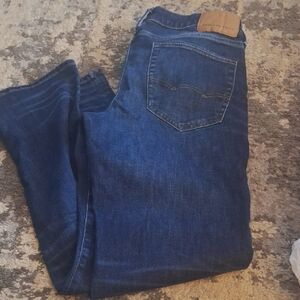 American Eagle Dark Blue Denim with Tan Patch